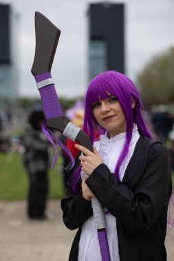 Bükreş, Romanya - 27 Nisan 2025: Doğu Avrupa Comic Con 'da Cosplayers. Çizgi roman, film, TV dizisi, bilim kurgu ve fantezi, oyun, Japon kültürü, Anime, Manga, tahta oyunları, kart oyunları ve son olarak da teknoloji oyunlarını seviyorlar..