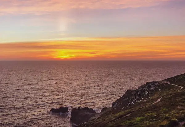 İngiltere, Corwall 'daki St. Agnes Head' de gün batımı.