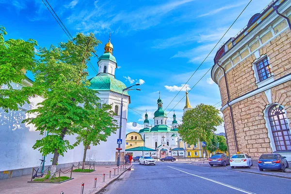 Lavrska street in Pechersk district with wall and bell towers of Kyiv Pechersk Lavra Monastery (Monastery of the Caves) and St Theodosius Pechersky Monastery, Kyiv, Ukraine