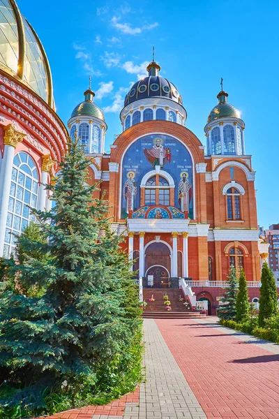 Stock image The beautiful facade of  Holy Protection Cathedral with mosaic icons and brick walls, Obolon, Kyiv, Ukraine