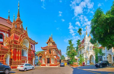 Panoramic view of the ornate monastic buildings on grounds of Wat Saen Muang Ma temple, Chiang Mai, Thailand