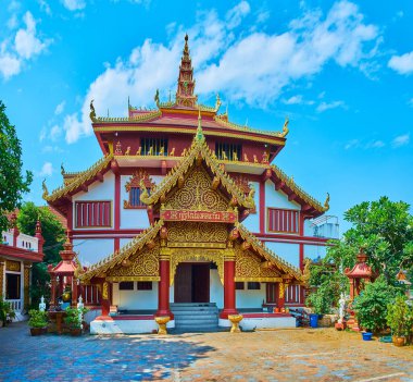 Ornate Lanna style monastic multipurpose building of Wat Ratcha Monthian temple, Chiang Mai, Thailand