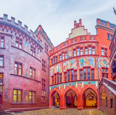 Panorama of Basel town hall courtyard with colorful frescoes, Switzerland