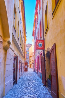 PRAGUE, CZECHIA - MARCH 11, 2022: Empty narrow Kozna street in Mala Strana (old town), on March 11 in Prague, Czechia