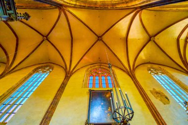 PRAGUE, CZECHIA - MARCH 11, 2022: Original Gothic ribbed vault of the side aisle of Church of Our Lady before Tyn, on March 11 in Prague, Czechia