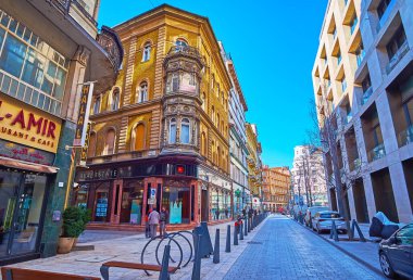BUDAPEST, HUNGARY - FEB 22, 2022: Historic architecture on Petofi Sandor Street with vintage stores and hotels, on Feb 22 in Budapest