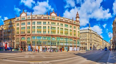 BUDAPEST, HUNGARY - FEB 22, 2022: Panorama of Kossuth Lajos Street with historic architecture and splendid Brudern House, on Feb 22 in Budapest