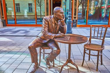 BUDAPEST, HUNGARY - FEB 22, 2022: The statue of Gyula Krudy in Downtown, Duna Street, on Feb 22 in Budapest