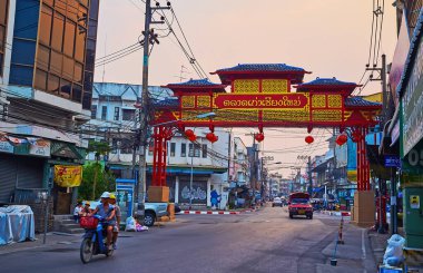 CHIANG MAI, THAILAND - MAY 3, 2019: The scenic Chinese Welcome Gate, in Chinatown against the twilight sky, Chiang Moi Road, on May 3 in Chiang Mai