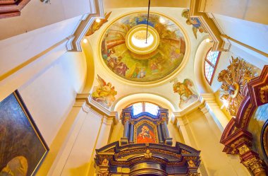 PRAGUE, CZECHIA - MARCH 11, 2022: The dome of the small chapel in Loreta complex, on March 11 in Prague, Czechia