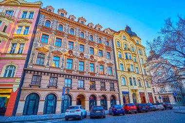 PRAGUE, CZECHIA - MARCH 11, 2022: Outstanding facade with frescoes on historical mansion on Kozi street in Stare Mesto district, on March 11 in Prague, Czechia