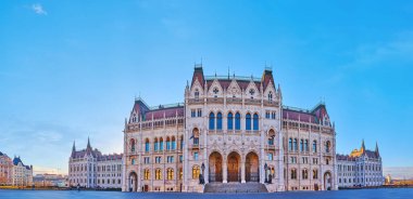 Panorama with Gothic Parliament building, surround with large pedestrian area of Lajos Kossuth Square, Budapest, Hungary