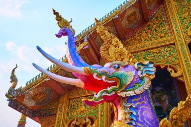 The roaring winged elephant (Hatsadiling) statue in Wat Chetawan temple, in front of the Viharn Hall, Chiang Mai, Thailand