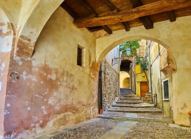 Enjoy the old town walk in Castello with many narrow curved streets, historic houses and interesting tourist spots, Valsolda, Italy