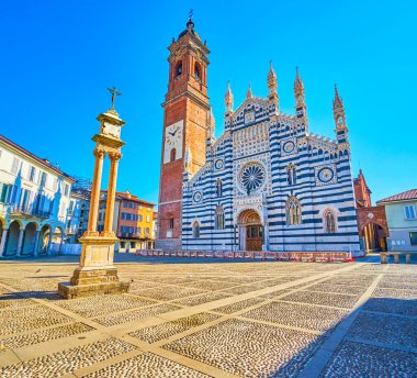 Piazza Duomo with striped facade of Monza Cathedral, Monza, Italy
