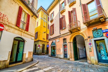 MILAN, ITALY - APRIL 11, 2022: The maze of narrow streets in old town, on April 11 in Milan, Italy