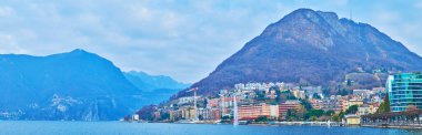 Lugano Panoraması, Monte San Salvatore ile çevrili, renkli evler ve Lugano Gölü ile çevrili, Ticino, İsviçre