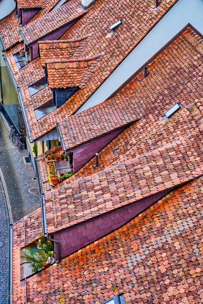 stock image Charming and traditional red tiled roofs of medieval houses in old town of Bern, Switzerland