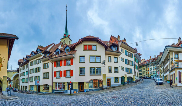 Panorama of Matte district with medieval townhouses and the spire of Nydeggkirche church in Bern, Switzerland