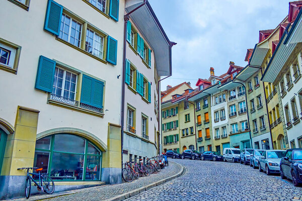 Curved Nydeggstalden is one of the most known street in old Matte district in Bern, Switzerland