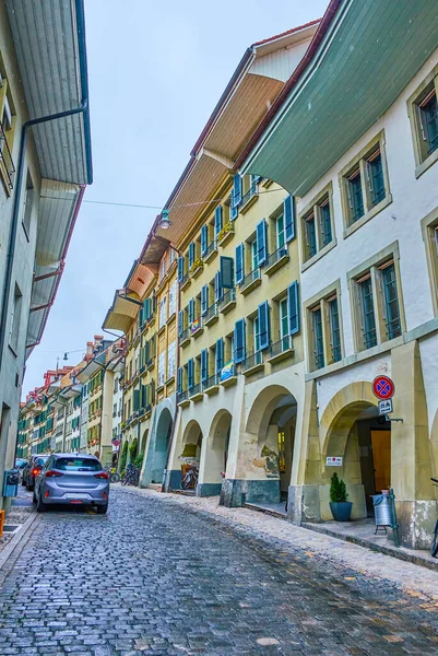 Scenic Bernese stone buildings with arcades on Postgasse street, Switzerland