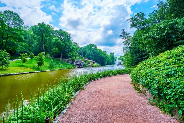 Stock image Narrow path along the shore of Ionian Sea  lake in Sofiyivka Park, Uman, Ukraine