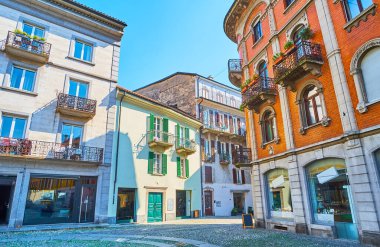 The dense old living houses on Piazza and Via Sant'Antonio in Locarno, Switzerland clipart