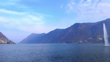 Lugano Gölü, Lugano Gölü (Lugano Körfezi 'nde Su Jeti), Puslu Alpler ve yamaçlarında küçük köyler bulunan Monte Bre, Lugano, İsviçre