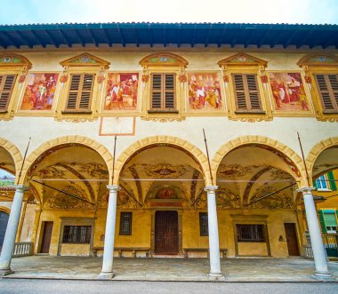 The colored frescoes on the facade wall of Santa Maria di Loreto Church, Lugano, Switzerland clipart