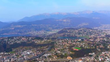 Lugano, arka planda Muzzano Gölü, Lugano Gölü ve Lepontine Alpleri, Ticino, İsviçre