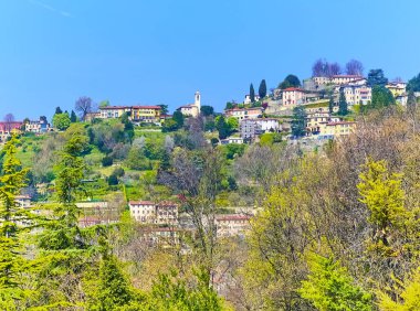 San Vigilio Hill slope with gardens and villas from the Parco di San Giovanni (St John Park) in Citta Alta (Upper Town), Bergamo, Italy clipart