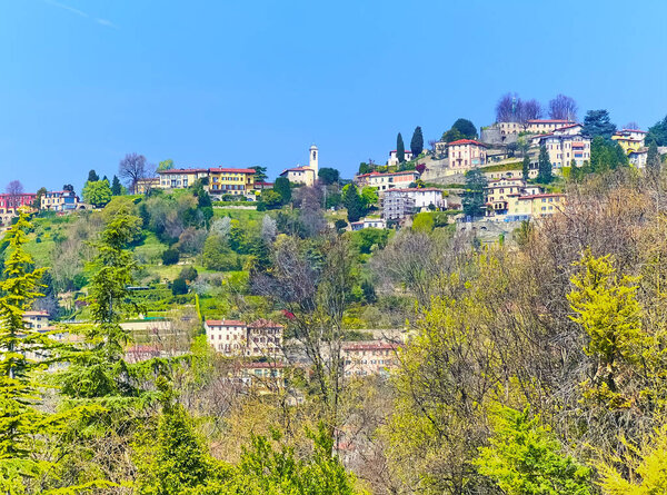 San Vigilio Hill slope with gardens and villas from the Parco di San Giovanni (St John Park) in Citta Alta (Upper Town), Bergamo, Italy
