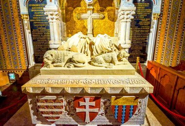 BUDAPEST, HUNGARY - FEBRUARY 28, 2022: The Tombs of King Bela III of Hungary and his wife Agnes of Antioch, Matthias Church, on February 21 in Budapest, Hungary clipart