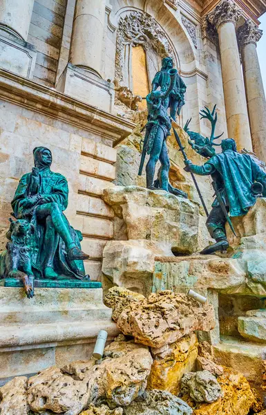 stock image Matthias Fountain with bronze sculptural group of King Matthias, hunters, hounds, Helen the Fair, located on the side wall of Buda Castle, Budapest, Hungary