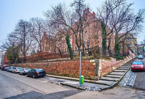 stock image The outstanding Neo-Gothic styled  Toldy Ferenc Gimnazium (High School) building behind the trees, Budapest, Hungary