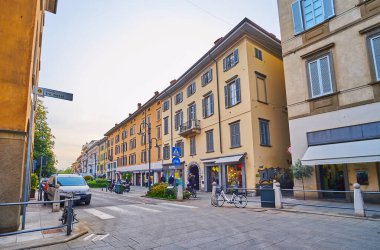 BERGAMO, ITALY - APRIL, 7, 2022: The vintage houses the on old Via Torquato Tasso, Citta Bassa, Bergamo, Italy clipart