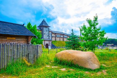 The palisade and the wooden citadel of the renovated Kyiv Rus Ethno Park, Ukraine clipart