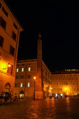 Ancient Egyptian Obelisk of Pharao Psamtik II (Obelisk of Montecitorio) on Piazza Montecitorio in Rome, Italy clipart