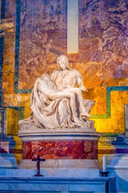 VATICAN CITY - JANUARY 13, 2019: Our Lady of Piety (Madonna della Pieta), the iconic Renaissance sculpture by Michelangelo, located in St Peters Basilica, on January 13 in Vatican City clipart