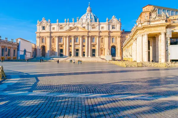 stock image Saint Peter's Square (Piazza San Pietro) with magnificent facade of Saint Peter's Basilica, Vatican City