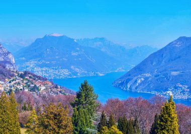 Parco San Grato opens the view of Monte Bre and Monte Boglia seen behind the Lake Lugano, Carona, Switzerland clipart