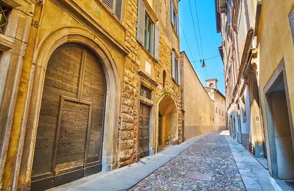 stock image The medieval Via Arena, lined with historic townhouses, one of its main landmarks is the Church of Santa Grata, Bergamo, Italy