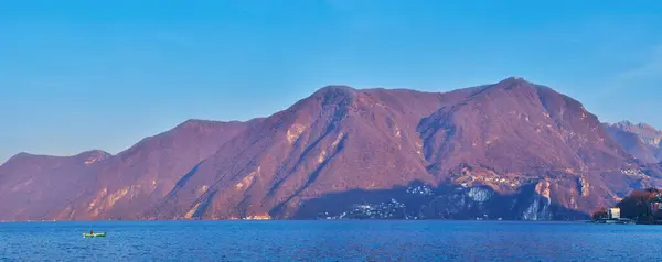 stock image The sunset panorama of Monte Sighignola from the bank of Ceresio Lake, Lugano, Ticino, Switzerland