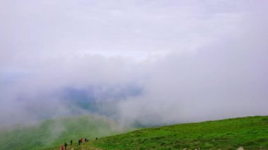 The picturesque misty landscape of Chornohora Mountain Range from the top of Mount Hoverla, Carpathians, Ukraine