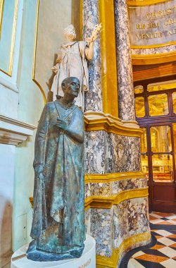 BERGAMO, ITALY - APRIL 7, 2022: The bronze statue of San Carlo Borromeo in Bergamo Cathedral, Bergamo, Italy clipart