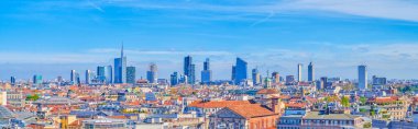 The roofs ofhistoric buildings and the Milan Financial District on Porta Nuova in the background, Italy. clipart