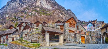 Panorama of Brontallo medieval Alpine village with old stone houses, nestled on the slope of Pizzo di Brunesc, Val Lavizzara, Valemaggia, Ticino, Switzerland clipart