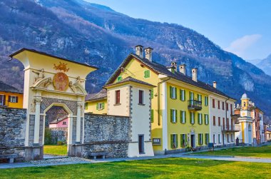 Cevio historic centre - Piazza square with Villa Calanchini-Respini and mountains in the background, Valle Maggia, Ticino, Switzerland clipart