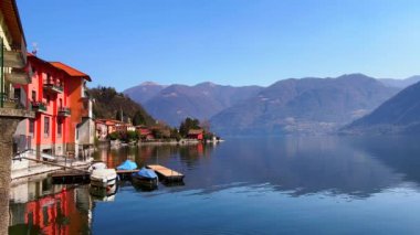 Alp manzarasının, Lugano Gölü 'nün mavi sularının, San Mamete' nin renkli evlerinin ve İtalya 'nın göl kıyısından küçük demirli teknelerin tadını çıkarın.