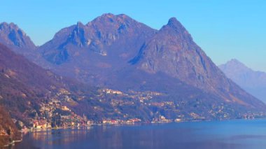 Lugano Gölü çevresindeki Alp manzarası kayalık Monte dei Pizzoni ve Monte Bronzone, Lombardy, İtalya